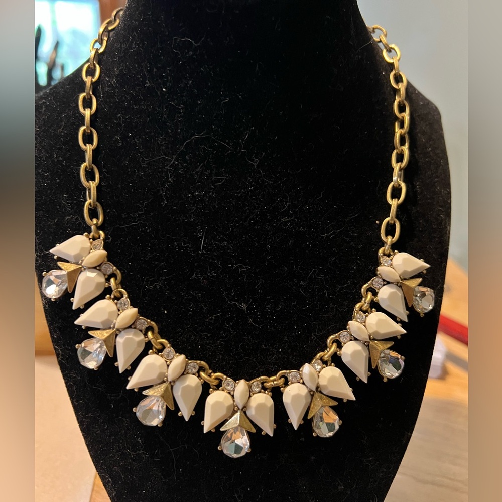 J Crew signed off white cabochon and rhinestone angel necklace with extender.